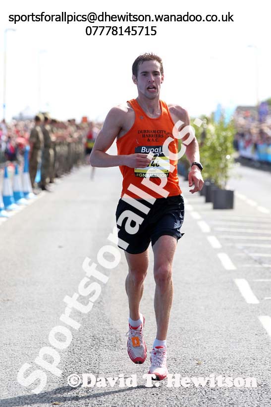 Dan Jenkin finishing the mens 2014 BUPA Great North Run. Photo: David T. Hewitson/Sports for All Pics